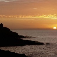 Mumbles Light House at sunrise