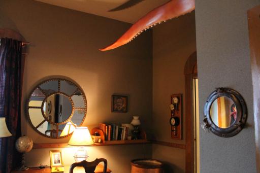 desk and giant octopus tentacle in Jules Verne room